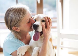 Women with golden dog